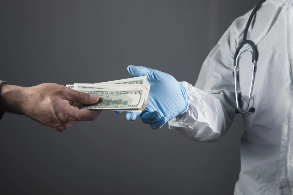 The image shows a person in medical attire receiving money from another person for a lip blush treatment.